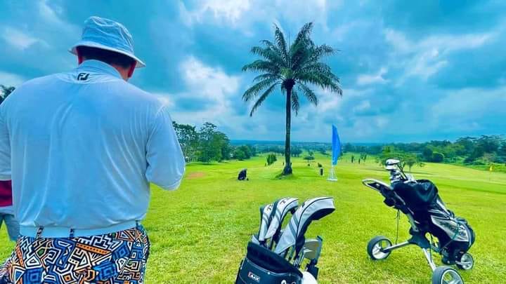 A golfer playing at the Calabar Golf Club.