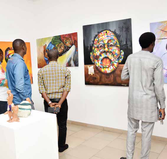 Art lovers observing art pieces in the Moriri Art GAllery.