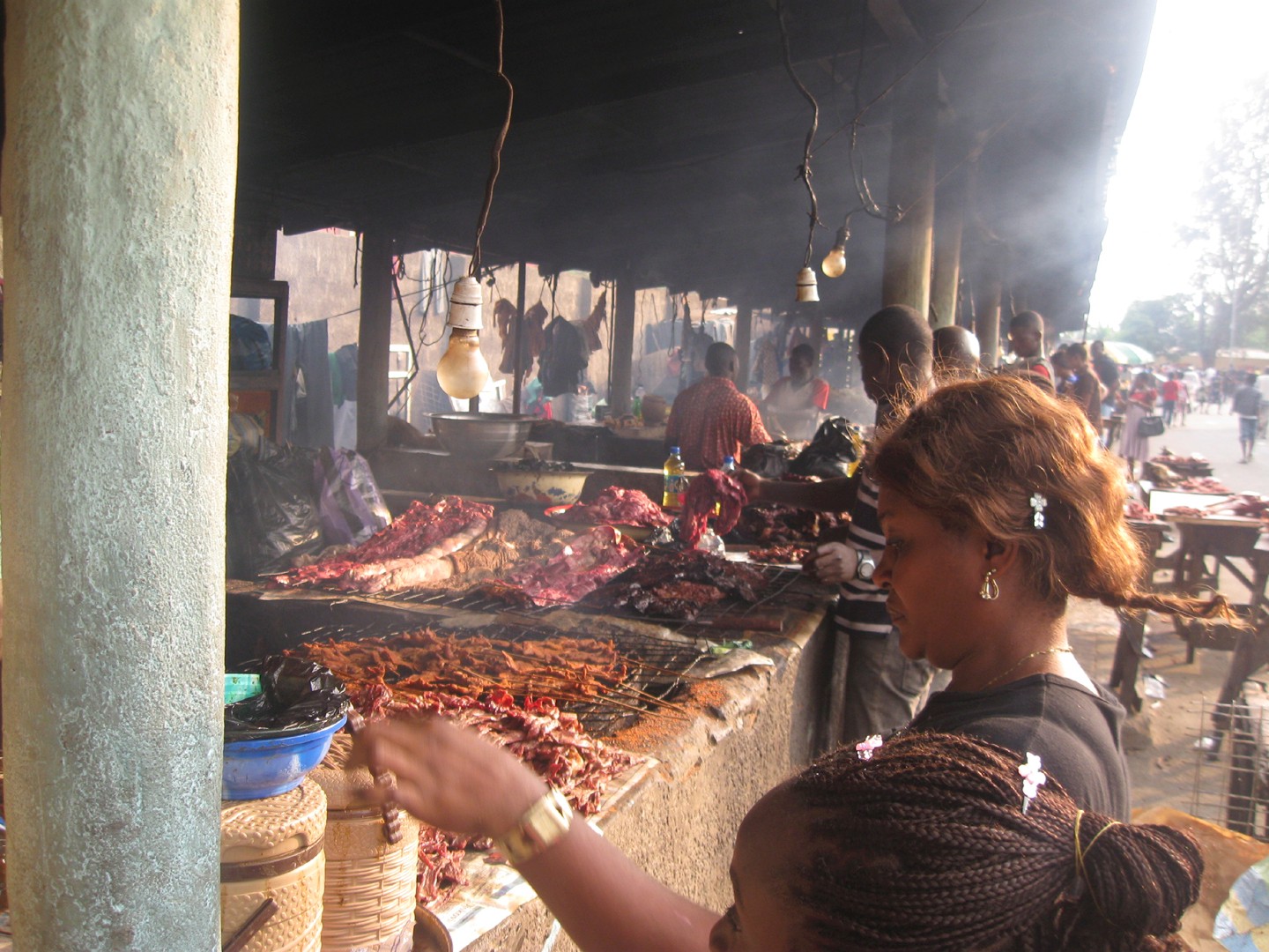 A customer buying suya at the Suya Arcade in Bogoberi, Calabar